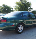 ford taurus 1999 dk  green sedan se gasoline v6 front wheel drive automatic with overdrive 76011