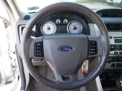 ford focus 2010 silver sedan se gasoline 4 cylinders front wheel drive automatic with overdrive 76011