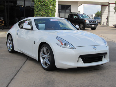 nissan 370z 2011 white coupe touring gasoline 6 cylinders rear wheel drive shiftable automatic 77477