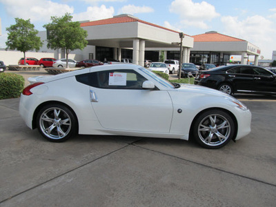 nissan 370z 2011 white coupe touring gasoline 6 cylinders rear wheel drive shiftable automatic 77477