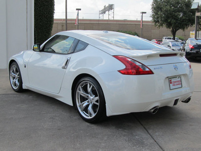 nissan 370z 2011 white coupe touring gasoline 6 cylinders rear wheel drive shiftable automatic 77477