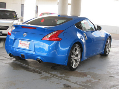 nissan 370z 2011 blue coupe touring gasoline 6 cylinders rear wheel drive shiftable automatic 77477