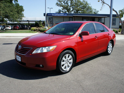 toyota camry 2009 red sedan xle gasoline 6 cylinders front wheel drive shiftable automatic 76087