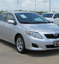 toyota corolla 2009 silver sedan xle gasoline 4 cylinders front wheel drive automatic with overdrive 77469