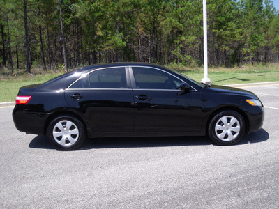 toyota camry 2009 black sedan gasoline 4 cylinders front wheel drive automatic 75604