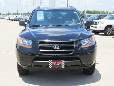 hyundai santa fe 2009 black suv gls gasoline 6 cylinders front wheel drive shiftable automatic 77469