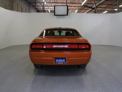 dodge challenger 2011 orange coupe r t gasoline 8 cylinders rear wheel drive automatic 75219