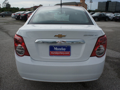 chevrolet sonic 2012 white sedan gasoline 4 cylinders front wheel drive 6 spd auto connivity plus 77090