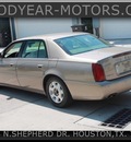cadillac deville 2002 brown sedan dts gasoline 8 cylinders front wheel drive automatic 77008