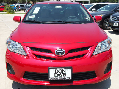 toyota corolla 2012 red sedan le 4 cylinders automatic 76011