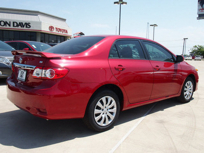 toyota corolla 2012 red sedan le 4 cylinders automatic 76011