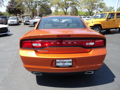 dodge charger 2011 orange sedan se gasoline 6 cylinders rear wheel drive automatic 60443