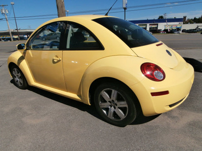 volkswagen beetle 2006 yellow hatchback gasoline 5 cylinders front wheel drive 5 speed manual 13502