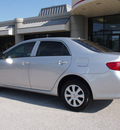 toyota corolla 2010 silver sedan le gasoline 4 cylinders front wheel drive automatic 76011