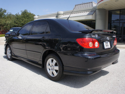 toyota corolla 2005 black sedan s gasoline 4 cylinders front wheel drive automatic 76011