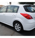 nissan versa 2011 white hatchback gasoline 4 cylinders front wheel drive automatic with overdrive 77581