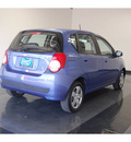 chevrolet aveo 2009 blue hatchback lt gasoline 4 cylinders front wheel drive not specified 77630
