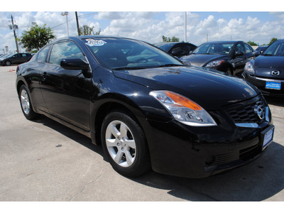 nissan altima 2009 black coupe gasoline 4 cylinders front wheel drive automatic with overdrive 77598