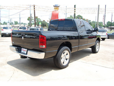dodge ram pickup 1500 2005 black pickup truck slt gasoline 8 cylinders rear wheel drive automatic with overdrive 77657