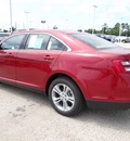 ford taurus 2013 red sedan sel gasoline 6 cylinders front wheel drive 6 speed automatic 77388