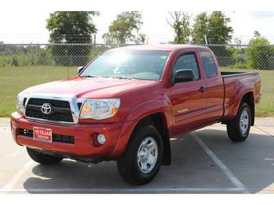toyota tacoma 2011 red prerunner v6 sr5 gasoline 6 cylinders 2 wheel drive automatic 77338