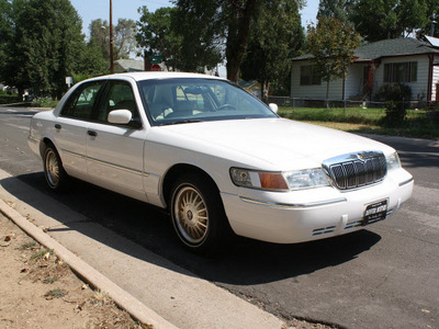 mercury grand marquis limited 1999 white sedan ls gasoline v8 rear wheel drive automatic with overdrive 80110
