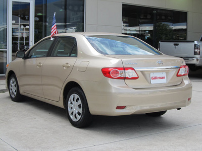 toyota corolla 2011 tan sedan le gasoline 4 cylinders front wheel drive automatic with overdrive 77090