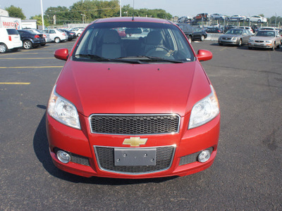 chevrolet aveo 2011 red hatchback aveo5 lt gasoline 4 cylinders front wheel drive automatic 19153