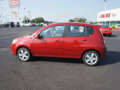 chevrolet aveo 2011 red hatchback aveo5 lt gasoline 4 cylinders front wheel drive automatic 19153