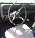 jeep wrangler 1990 gray gasoline 6 cylinders 4 wheel drive 5 speed manual 76049