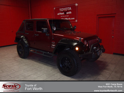 jeep wrangler unlimited 2007 red suv sahara gasoline 6 cylinders 4 wheel drive 6 speed manual 76116