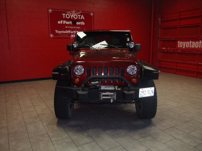 jeep wrangler unlimited 2007 red suv sahara gasoline 6 cylinders 4 wheel drive 6 speed manual 76116