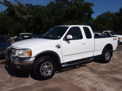 ford f 150 2003 white xlt gasoline 8 cylinders sohc 4 wheel drive automatic 77531