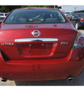 nissan altima 2009 dk  red sedan 2 5 s gasoline 4 cylinders front wheel drive automatic 77338