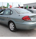 ford taurus 2005 lt  green sedan sel gasoline 6 cylinders front wheel drive automatic with overdrive 77020