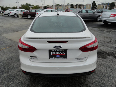 ford focus 2013 white sedan titanium flex fuel 4 cylinders front wheel drive automatic with overdrive 60546