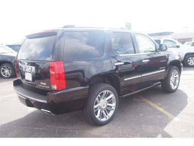 cadillac escalade 2013 black suv platinum edition 8 cylinders automatic 77074