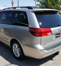 toyota sienna 2004 silver van xle limited 6 cylinders automatic 76087