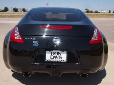 nissan 370z 2009 black coupe gasoline 6 cylinders rear wheel drive 6 speed manual 76018