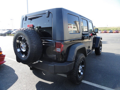 jeep wrangler unlimited 2008 black suv rubicn gasoline 6 cylinders 4 wheel drive automatic 60915