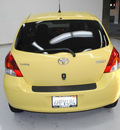 toyota yaris 2009 yellow hatchback gasoline 4 cylinders front wheel drive automatic 91731
