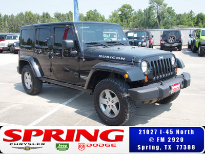 jeep wrangler unlimited 2012 black suv rubicon gasoline 6 cylinders 4 wheel drive automatic 77388