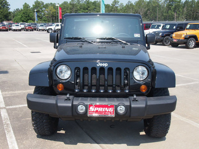 jeep wrangler unlimited 2012 black suv rubicon gasoline 6 cylinders 4 wheel drive automatic 77388