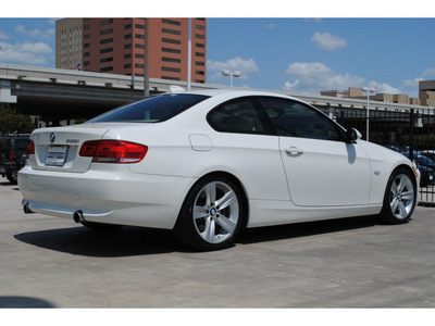 bmw 3 series 2009 white coupe 335i gasoline 6 cylinders rear wheel drive 6 speed manual 77002
