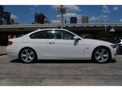bmw 3 series 2009 white coupe 335i gasoline 6 cylinders rear wheel drive 6 speed manual 77002