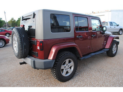 jeep wrangler unlimited 2008 dk  red suv sahara gasoline 6 cylinders 4 wheel drive automatic with overdrive 77590