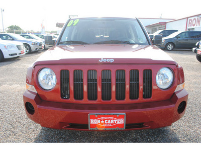 jeep patriot 2009 red suv sport gasoline 4 cylinders 2 wheel drive automatic with overdrive 77590