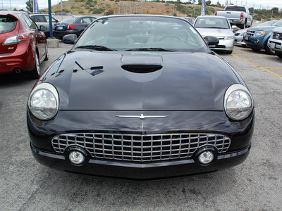 ford thunderbird 2002 black deluxe gasoline 8 cylinders rear wheel drive automatic 94010