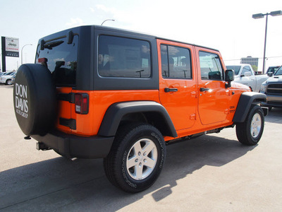 jeep wrangler unlimited 2013 orange suv sport gasoline 6 cylinders 4 wheel drive automatic 76011