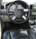 chrysler 300c srt 8 2006 black sedan srt 8 gasoline 8 cylinders rear wheel drive shiftable automatic 77099